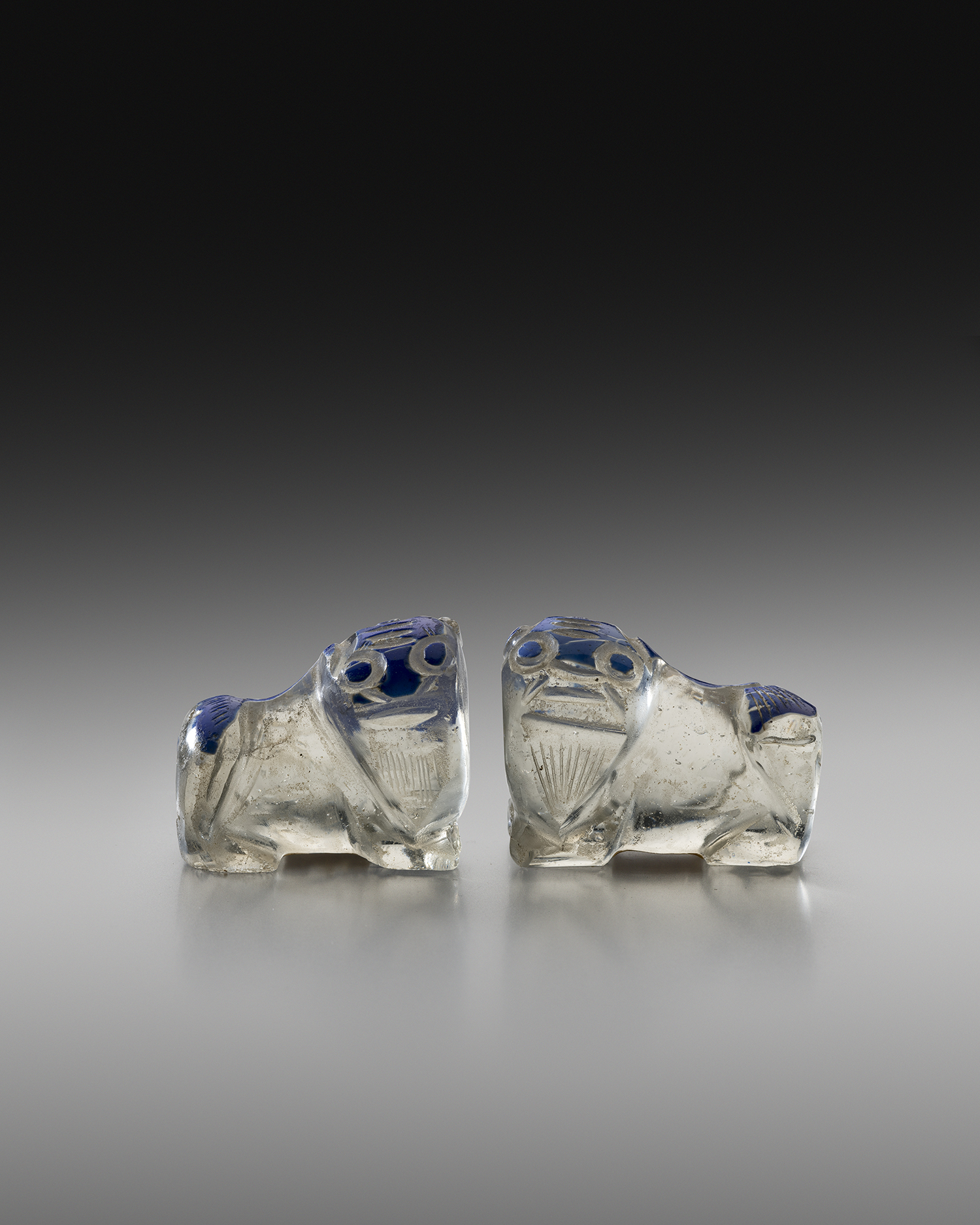 Pair of Carved Glass Foo Dogs