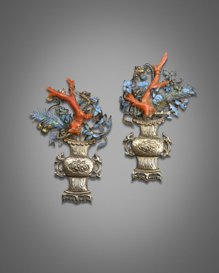 A pair of Chinese silver and kingfisher feather appliques