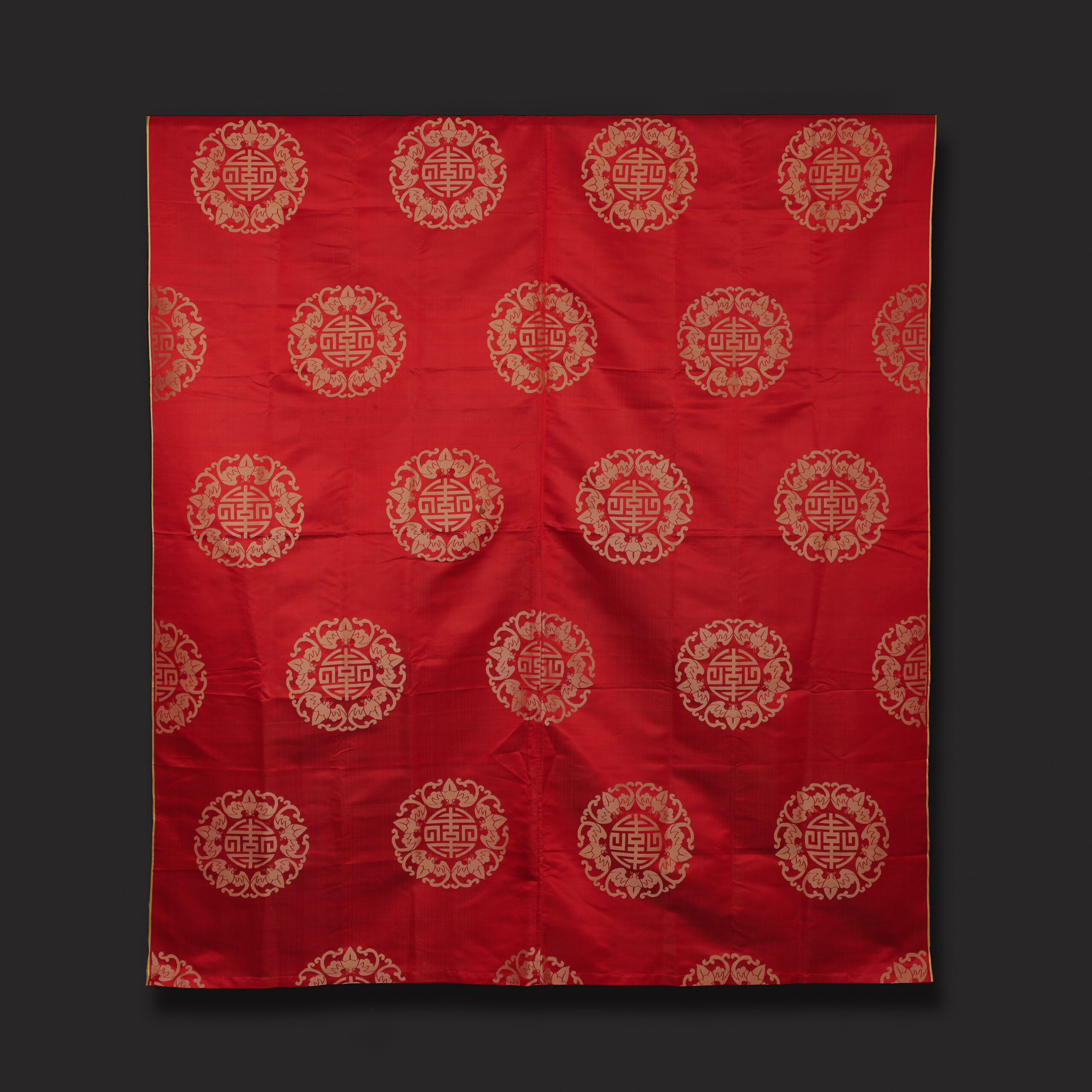 A Red and Gold Silk Panel
