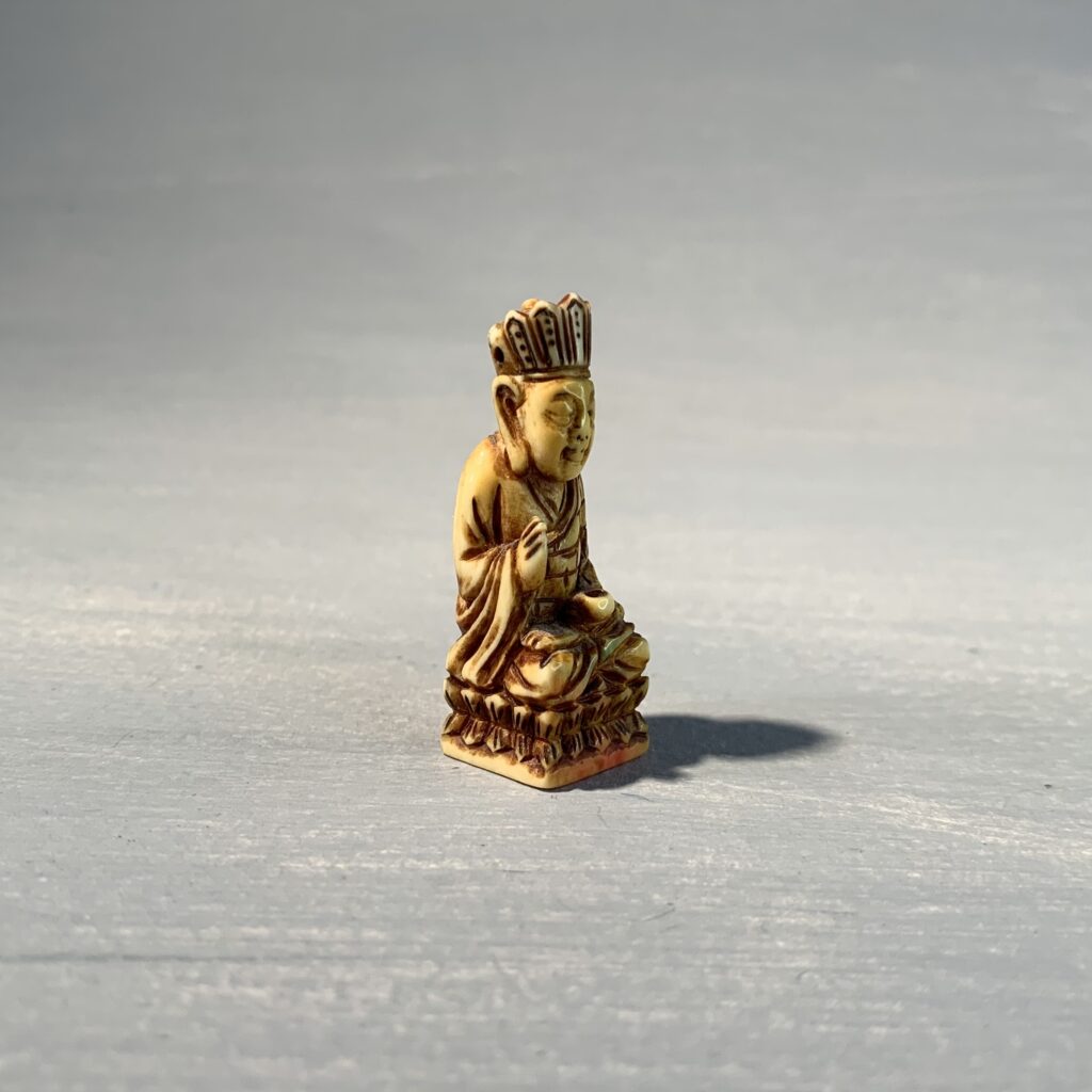 Ivory Seated Figure